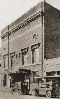 Postcard with view of the Strand Theatre in Laurel, Mississippi